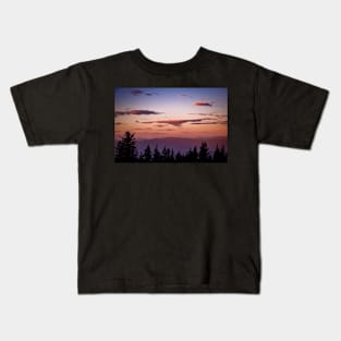 Clouds over mountains at sunset Kids T-Shirt